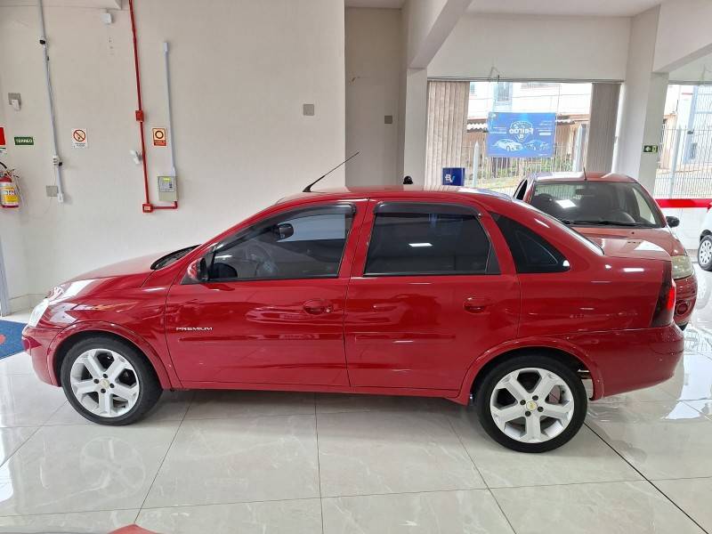 CHEVROLET - CORSA - 2010/2011 - Vermelha - R$ 33.900,00