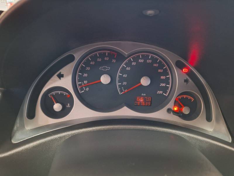 CHEVROLET - CORSA - 2010/2011 - Vermelha - R$ 33.900,00