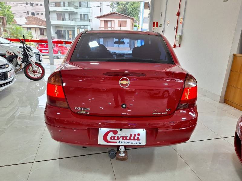 CHEVROLET - CORSA - 2010/2011 - Vermelha - R$ 33.900,00