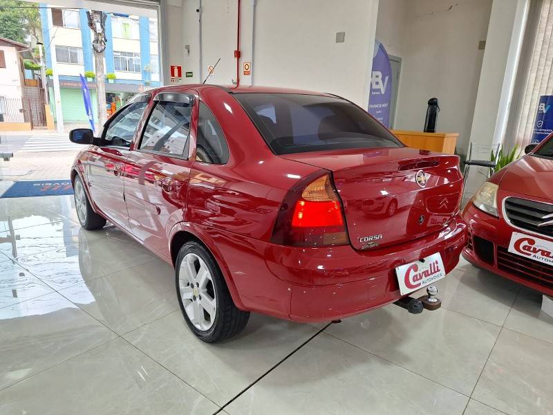 CHEVROLET - CORSA - 2010/2011 - Vermelha - R$ 33.900,00